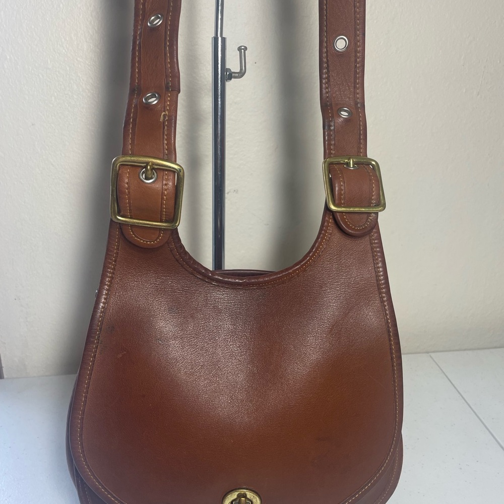 Stylish Brown Leather Shoulder Bag with Gold Buckles
